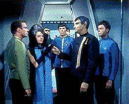 Amanda and Sarek being welcomed aboard the Enterprise